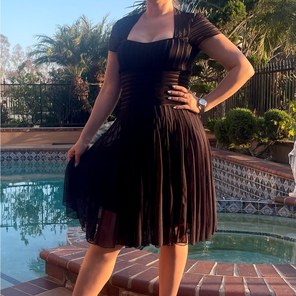 Black J S COLLECTION dress. Size 6 but actually good for size small and medium.